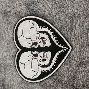 Two skull hear iron on patch